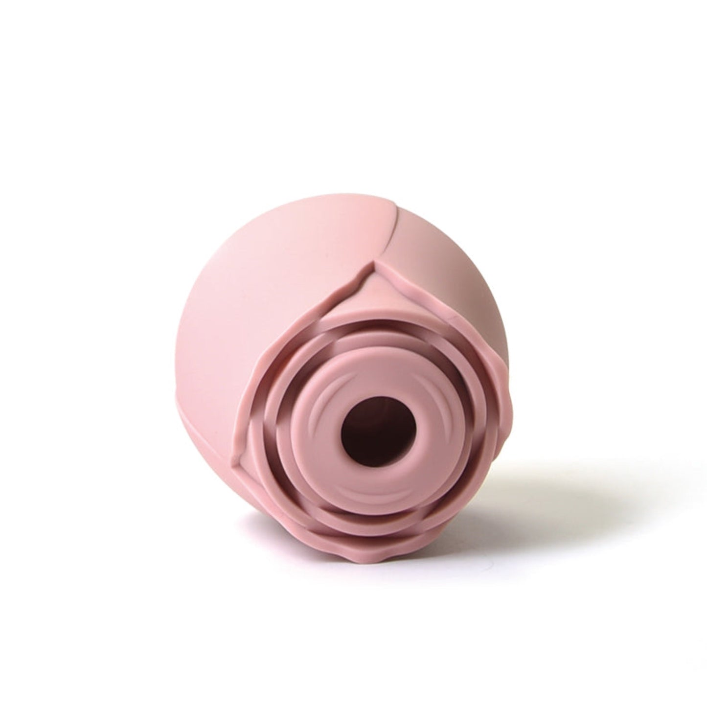 rose clitoral vibrator lying on side