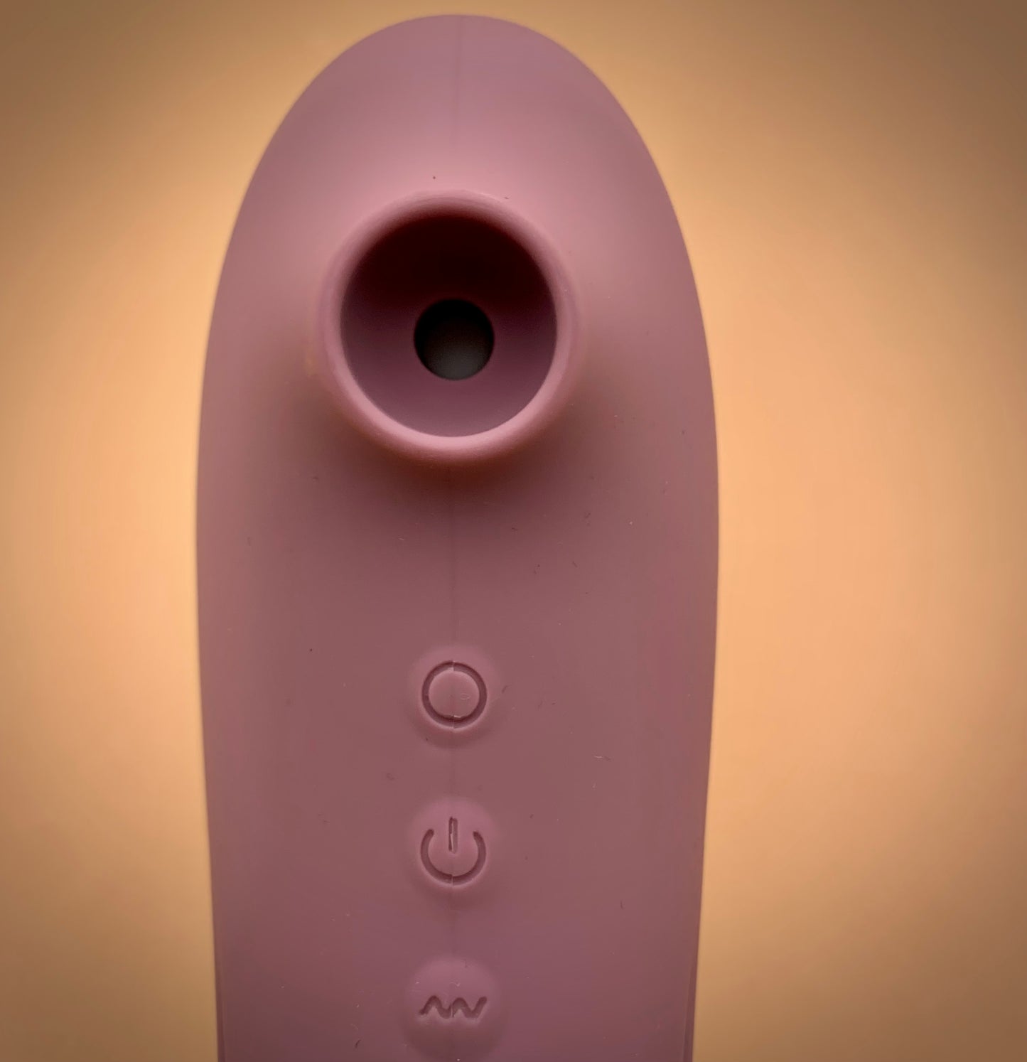 close-up of suction function of the dual action suction/vibrator toy
